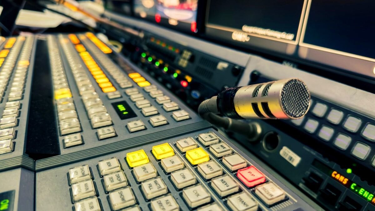 Microphone and control desk in a television studio